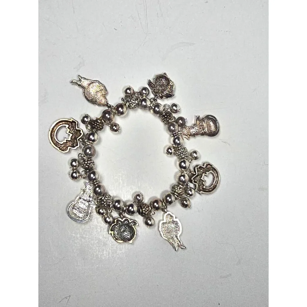 Avon Christmas Charm Bracelet Silver Tone Stretch Santa Snowman Wreath Jewelry
